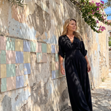 Ragnhild – Draperad overall med v-ringning och vida ben