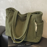 Edit – Ribbad toteväska med snodddetalj