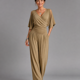 Tilda – Avslappnad overall med cold shoulder och omlottmidja