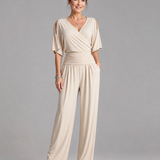 Tilda – Avslappnad overall med cold shoulder och omlottmidja