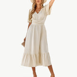 KLARISSE | ELEGANT FLÖDANDE SOMMAR V-HALS KLÄNNING
